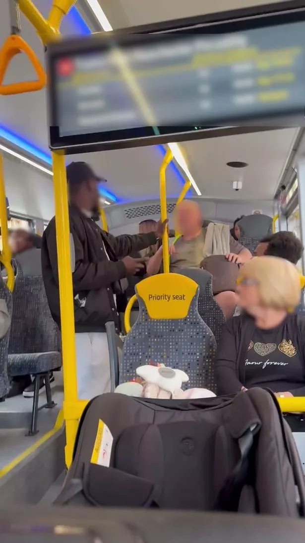 Passengers confronting the man on the bus