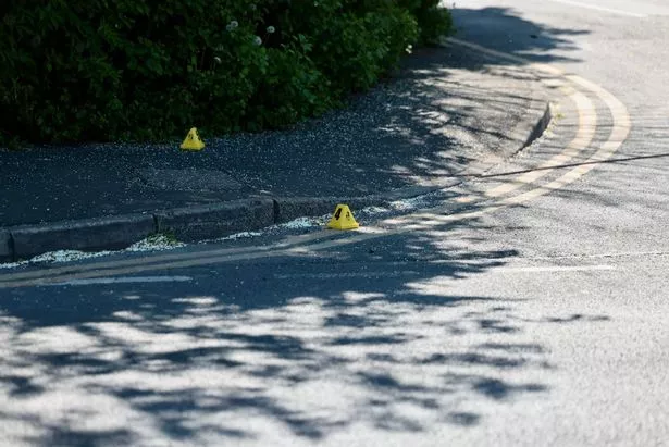 Evidence markers at the scene in Royton