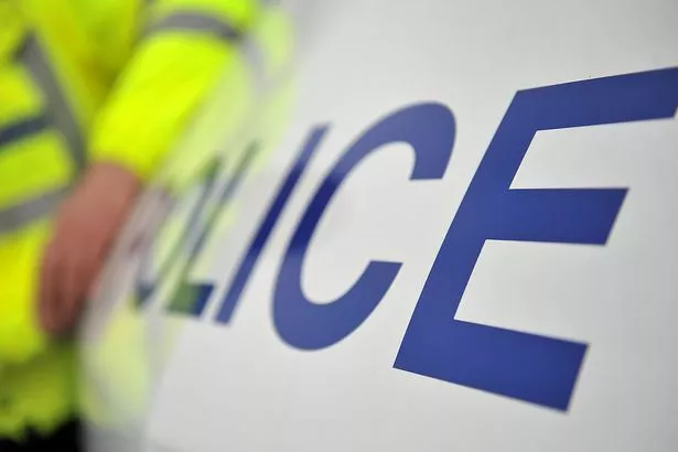 Greater Manchester Police in action during a raid