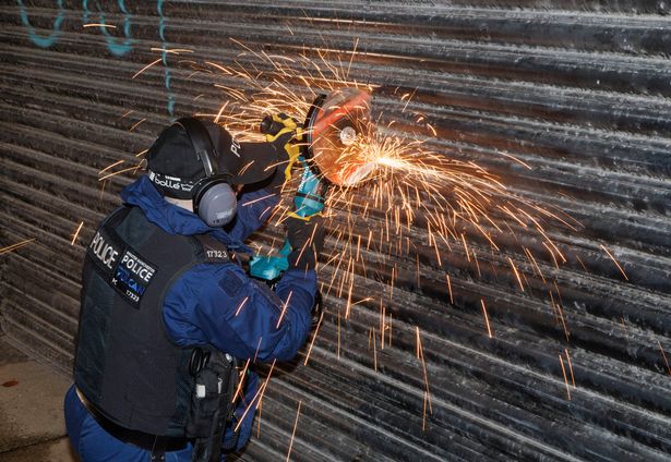 Police raid a counterfeit shop in November 2023