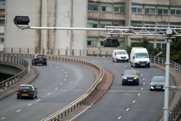 An AI traffic camera installed on a roadway