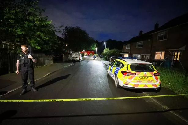 Police at the scene of the May 26 shooting incident in Little Hulton