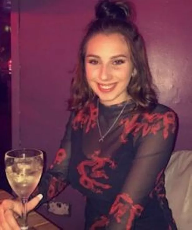 Leah Taylor smiling, showcasing her joyful nature.