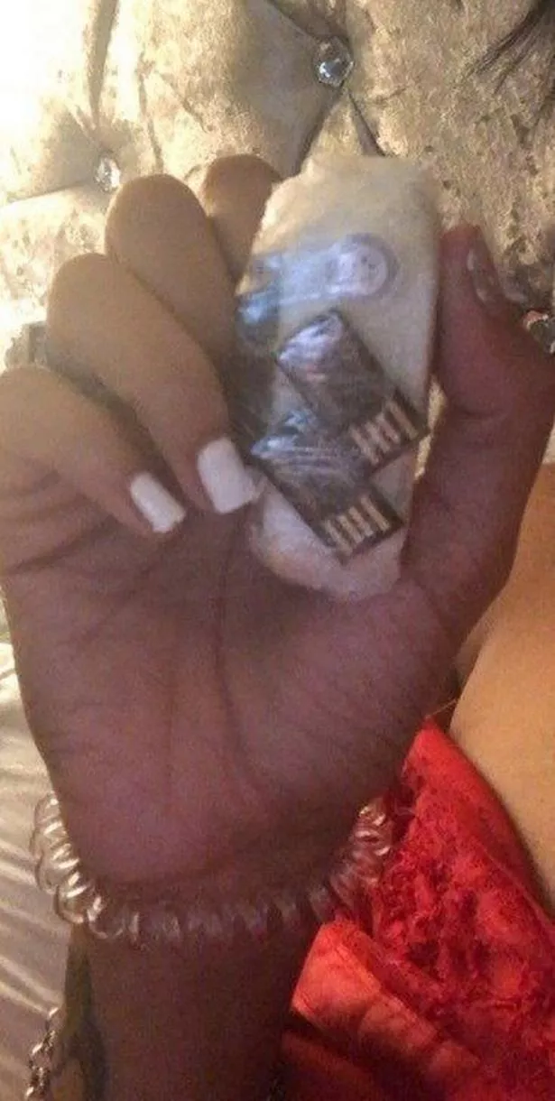 Ayesha Martin posted a picture of a cling film-wrapped package appearing to contain SIM cards.