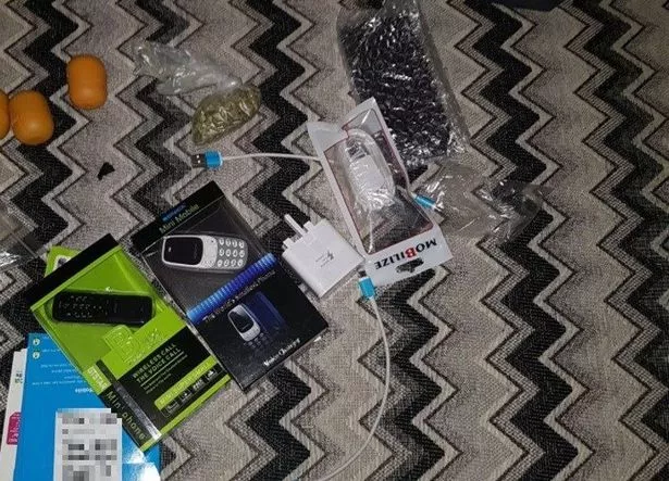 Mobile phones, chargers, and Kinder Egg holders found on Victoria Sked's phone.