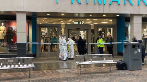Forensics team entering the Primark store to investigate.