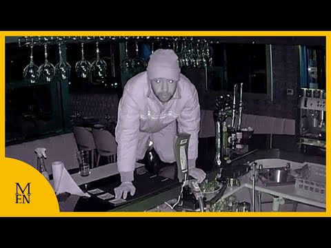 Burglar caught on CCTV crawling through pubs to steal cash