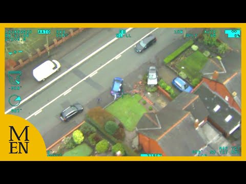 Aerial footage of police helicopter capturing suspects abandoning a stolen car